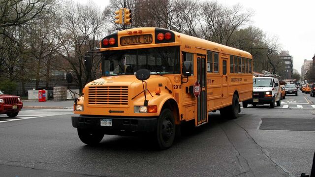 Electrifying US school bus fleets equitably to reduce air pollution exposure in underserved communities
